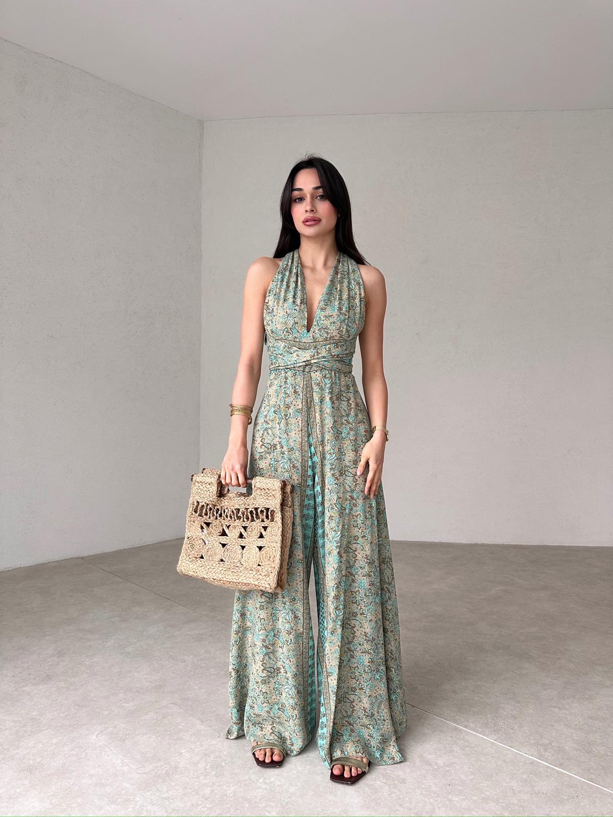 The HARPSTER Jumpsuit with Low-cut Back.